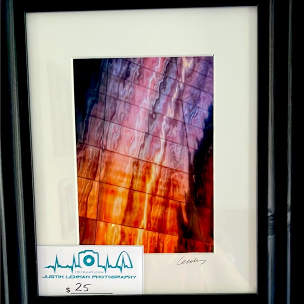 Photo by a local artist in a frame.